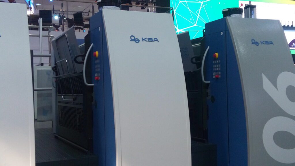 mounting the printing plates on the offset printing machine.