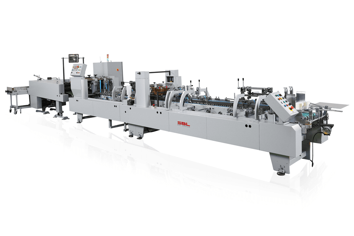 High-speed automatic folder gluer machine in a commercial post-press packaging line.